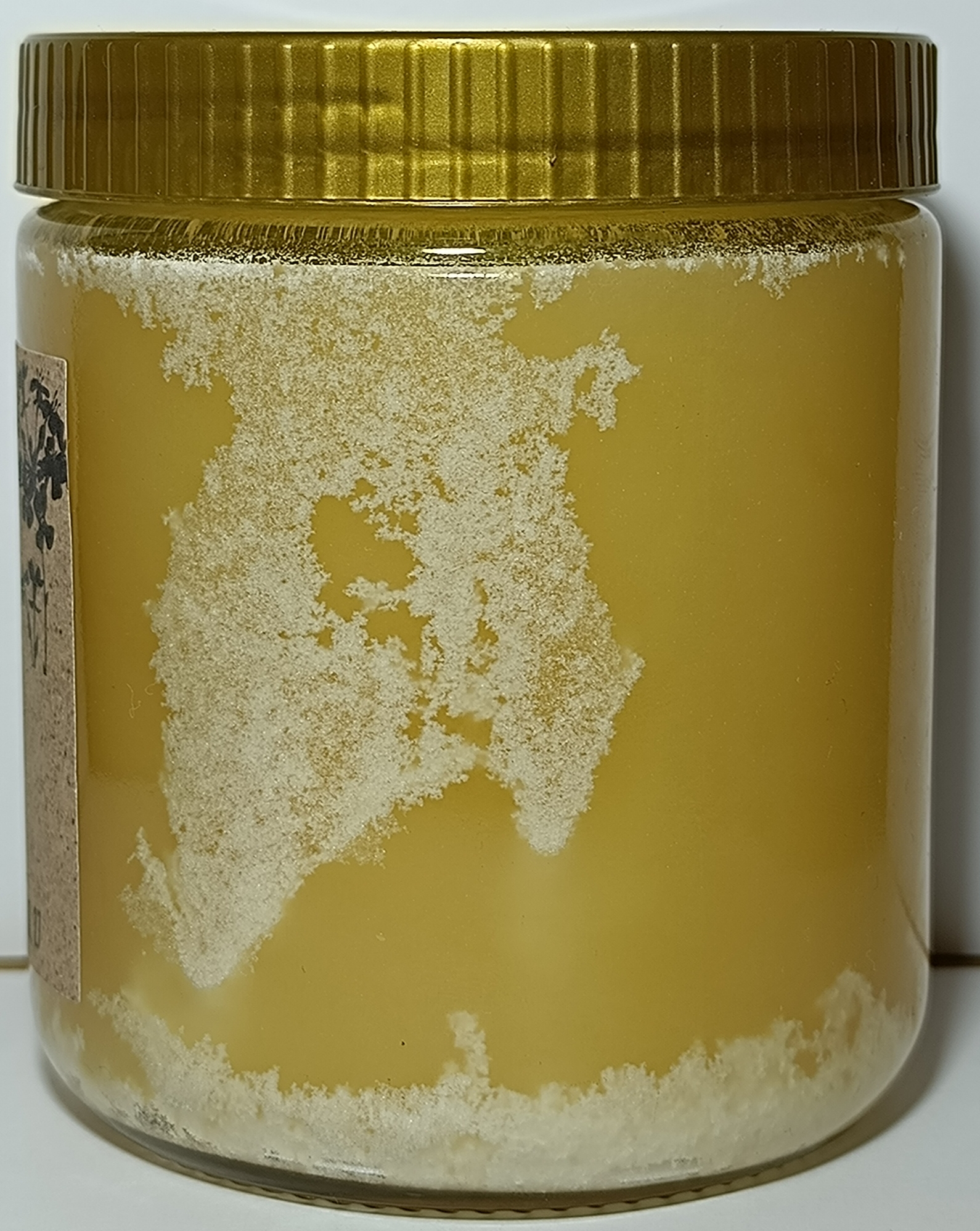 Honig mit Ausblühungen